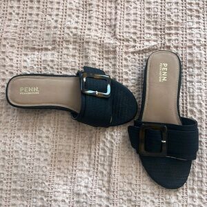 Black sliders with tortoiseshell buckle.  Size US 8W